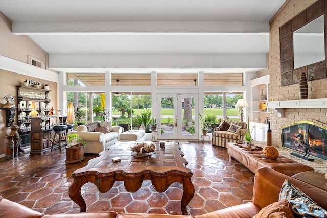 6303 Pebble Beach Dr, Houston, TX 77069 - living room featuring french doors, a brick fireplace, and vaulted ceiling with beams