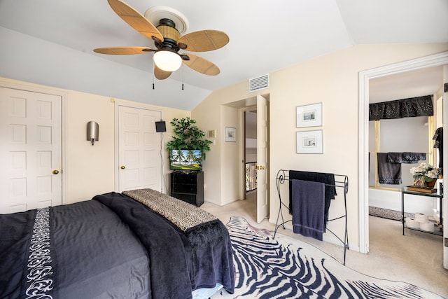 6303 Pebble Beach Dr, Houston, TX 77069 - bedroom with visible vents, light carpet, baseboards, ceiling fan, and vaulted ceiling