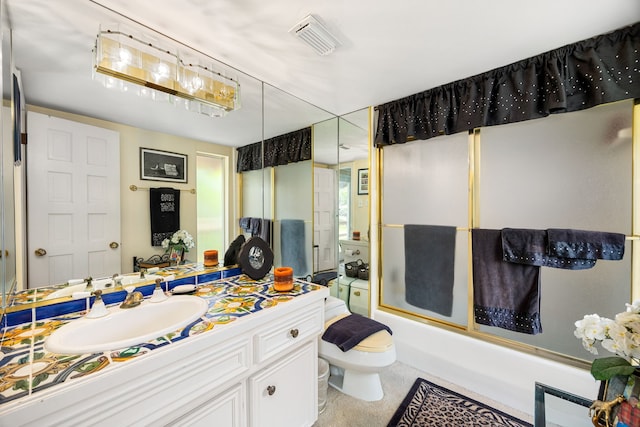 6303 Pebble Beach Dr, Houston, TX 77069 - bathroom featuring vanity, enclosed tub / shower combo, toilet, and visible vents