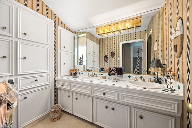 6303 Pebble Beach Dr, Houston, TX 77069 - bathroom with double vanity, a sink, a chandelier, and wallpapered walls