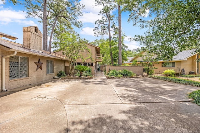 6303 Pebble Beach Dr, Houston, TX 77069 - view of patio / terrace with fence and a gate