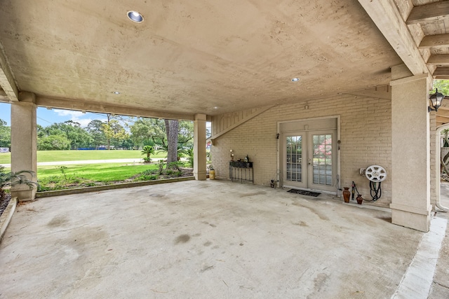 6303 Pebble Beach Dr, Houston, TX 77069 - view of patio / terrace featuring french doors