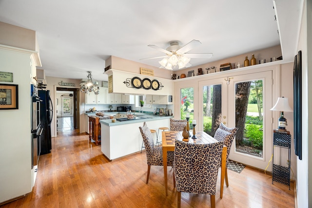6303 Pebble Beach Dr, Houston, TX 77069 - dining area featuring light wood-style floors and ceiling fan