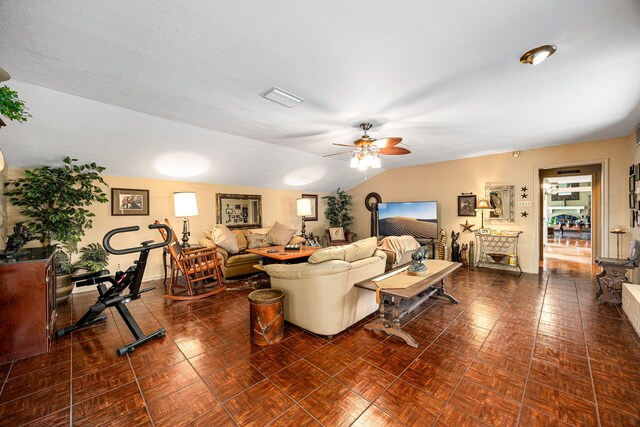 6303 Pebble Beach Dr, Houston, TX 77069 - living room featuring ceiling fan, visible vents, and vaulted ceiling