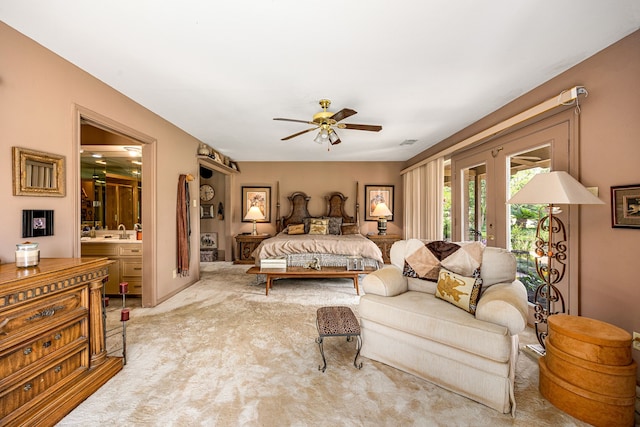 6303 Pebble Beach Dr, Houston, TX 77069 - bedroom with ceiling fan, light colored carpet, french doors, ensuite bathroom, and visible vents