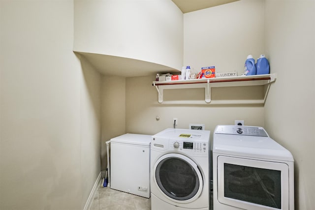2402 Chesley Park Ct, Katy, TX 77494 - laundry area featuring washer and dryer and baseboards