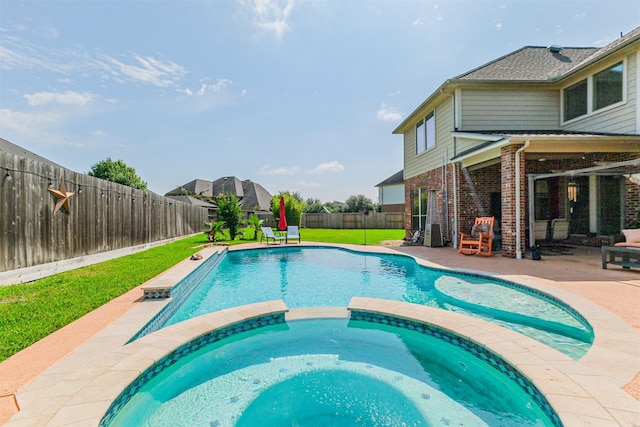 2402 Chesley Park Ct, Katy, TX 77494 - view of swimming pool featuring a patio area and a pool with connected hot tub
