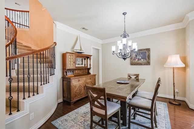2402 Chesley Park Ct, Katy, TX 77494 - dining space with dark wood-style floors, stairs, a chandelier, crown molding, and baseboards