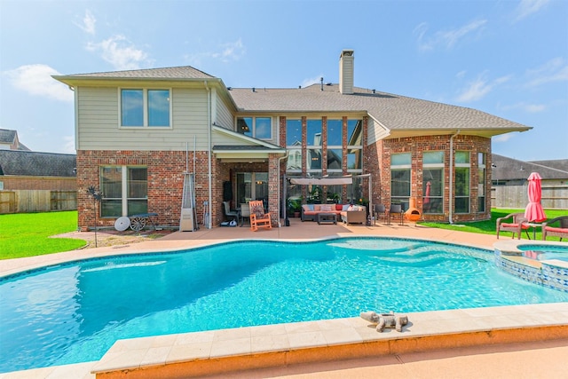 2402 Chesley Park Ct, Katy, TX 77494 - view of swimming pool with an outdoor living space, a patio area, a pool with connected hot tub, and fence