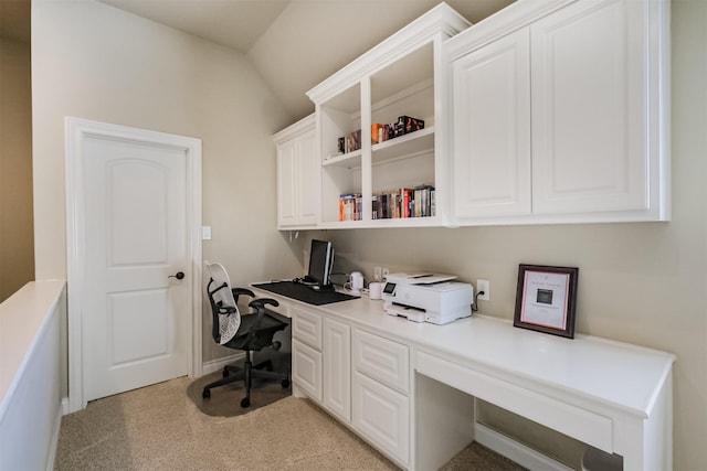 2402 Chesley Park Ct, Katy, TX 77494 - home office with built in study area, vaulted ceiling, and baseboards