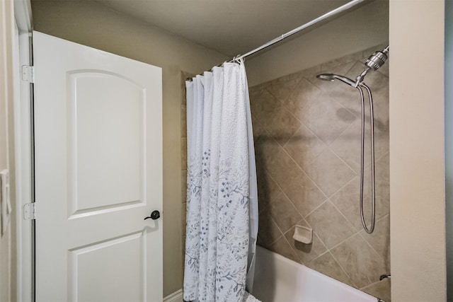 2402 Chesley Park Ct, Katy, TX 77494 - bathroom with shower / bath combo with shower curtain