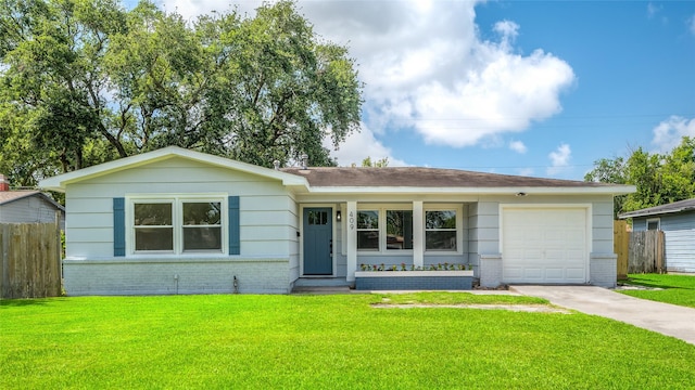 409 24th Ave N, Texas City, TX 77590 - ranch-style house with brick siding, an attached garage, and concrete driveway