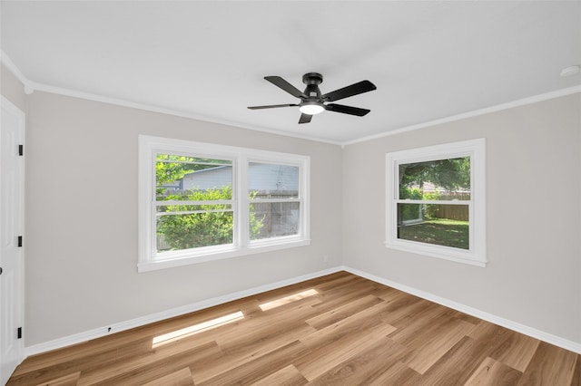 409 24th Ave N, Texas City, TX 77590 - unfurnished room with light wood-type flooring, healthy amount of natural light, ornamental molding, and ceiling fan