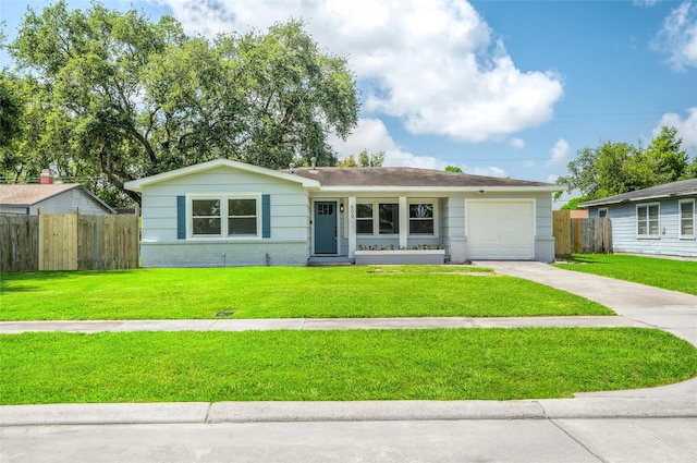 409 24th Ave N, Texas City, TX 77590 - single story home featuring concrete driveway, a garage, and brick siding