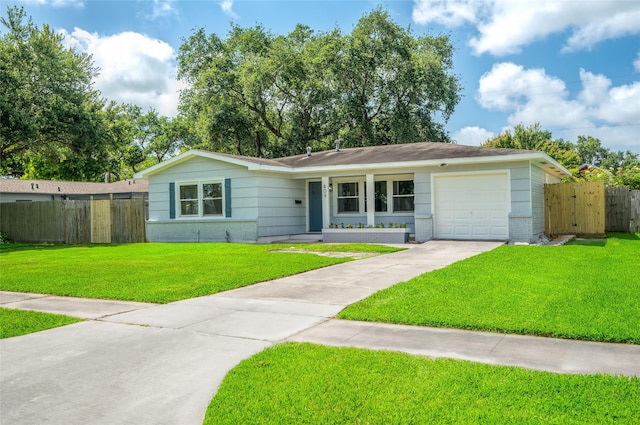 409 24th Ave N, Texas City, TX 77590 - single story home with concrete driveway, brick siding, and an attached garage