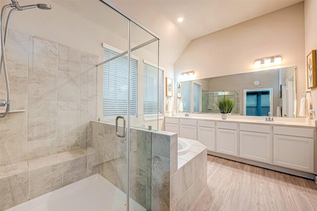 4723 Great Acre Ln, Fresno, TX 77545 - bathroom featuring vanity, a shower stall, a garden tub, and lofted ceiling