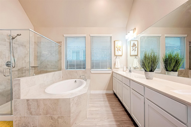 4723 Great Acre Ln, Fresno, TX 77545 - full bathroom with a healthy amount of sunlight, a stall shower, a bath, and lofted ceiling