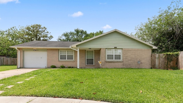 ranch-style home featuring a garage, a front lawn, fence, brick siding, and driveway
