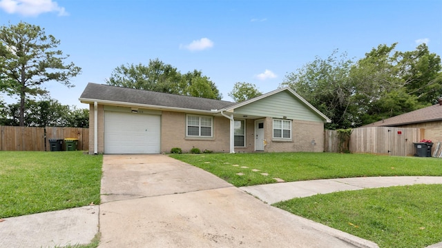 ranch-style home featuring brick siding, a garage, a front lawn, and driveway