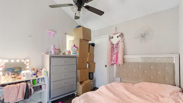 bedroom featuring ceiling fan and vaulted ceiling