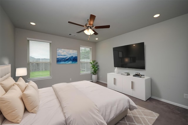 carpeted bedroom featuring visible vents, recessed lighting, baseboards, and ceiling fan