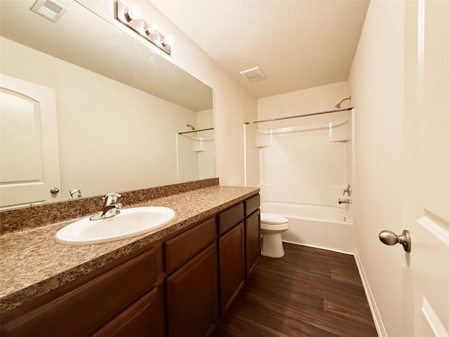 2093 Saras Way, Brookshire, TX 77423 - bathroom featuring visible vents, wood finished floors, toilet, and vanity