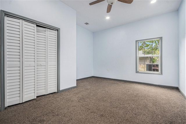 unfurnished bedroom with visible vents, carpet flooring, a closet, and recessed lighting