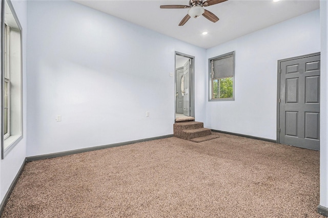 unfurnished room featuring carpet flooring, recessed lighting, ceiling fan, and baseboards