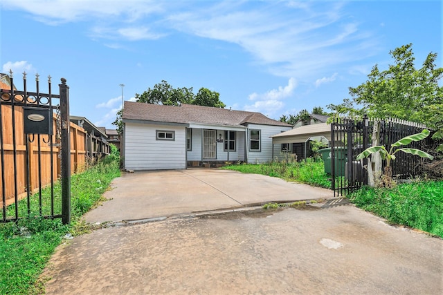 single story home with fence