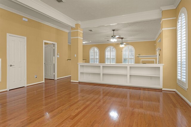 11406 Carson Ave, Pearland, TX 77584 - unfurnished living room with baseboards, a ceiling fan, crown molding, and wood finished floors