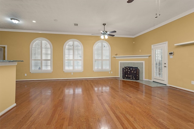 11406 Carson Ave, Pearland, TX 77584 - unfurnished living room with a ceiling fan, baseboards, visible vents, and ornamental molding