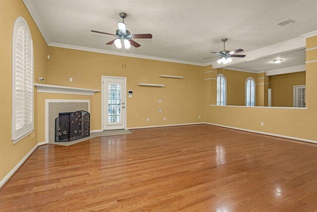 11406 Carson Ave, Pearland, TX 77584 - unfurnished living room with crown molding, ceiling fan, and light wood-style flooring