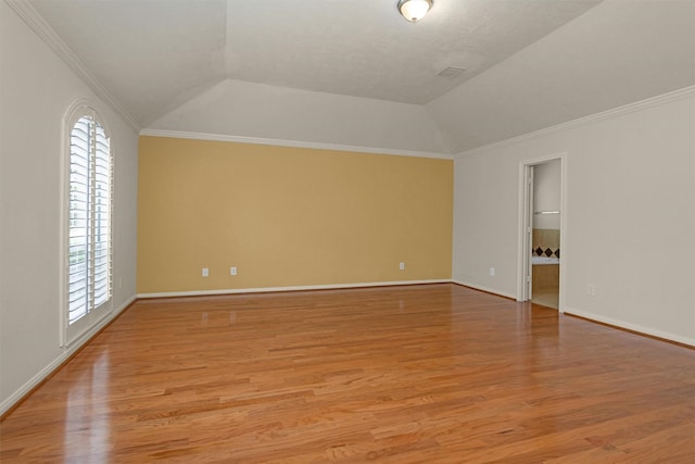 11406 Carson Ave, Pearland, TX 77584 - unfurnished room with plenty of natural light, ornamental molding, a raised ceiling, and light wood-type flooring