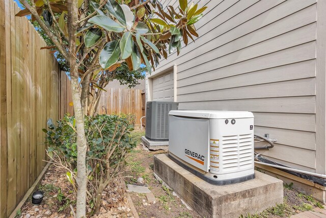 11406 Carson Ave, Pearland, TX 77584 - details featuring central air condition unit, fence, and a power unit