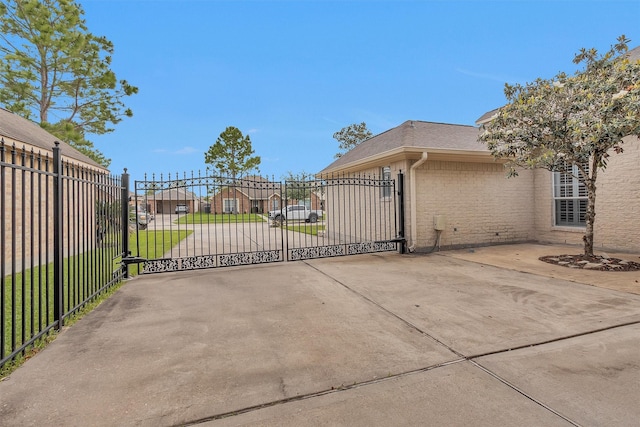 11406 Carson Ave, Pearland, TX 77584 - view of gate featuring fence and a residential view