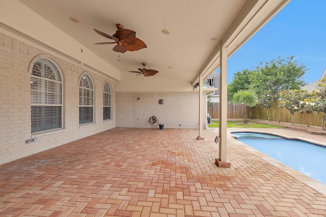11406 Carson Ave, Pearland, TX 77584 - view of patio / terrace with fence, a ceiling fan, and a fenced in pool