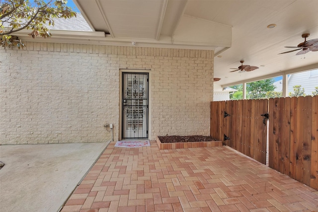 11406 Carson Ave, Pearland, TX 77584 - view of patio / terrace with fence, a ceiling fan, and a gate