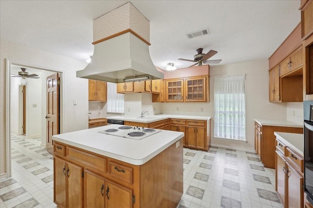 kitchen featuring ceiling fan, wallpapered walls, white electric cooktop, and light floors