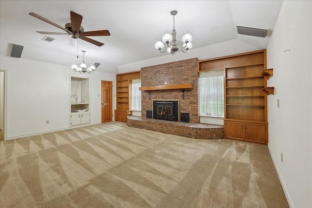 unfurnished living room featuring light colored carpet, baseboards, ceiling fan with notable chandelier, and visible vents