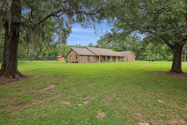 view of yard featuring fence