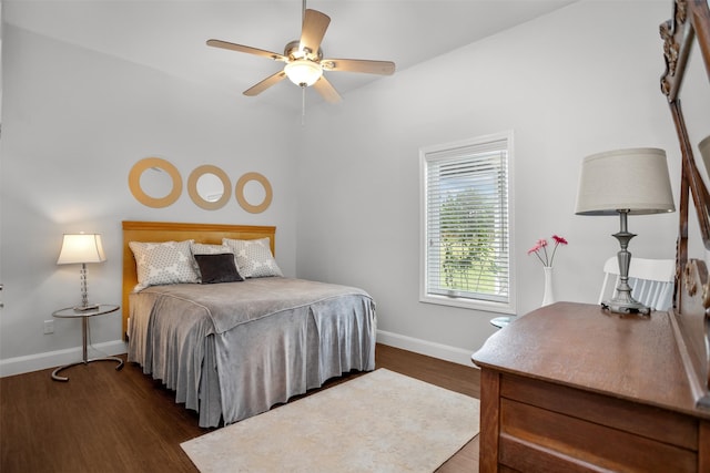 207 W Neyland St, Colmesneil, TX 75938 - bedroom with baseboards, a ceiling fan, and wood finished floors