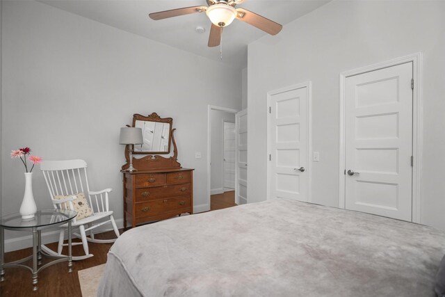 207 W Neyland St, Colmesneil, TX 75938 - bedroom with a ceiling fan, baseboards, and wood finished floors