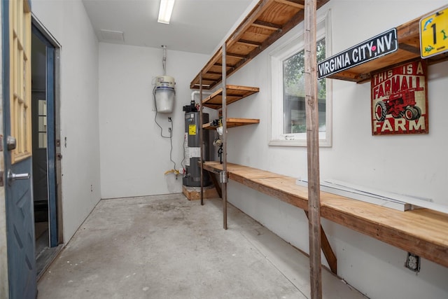 207 W Neyland St, Colmesneil, TX 75938 - below grade area featuring a baseboard heating unit and water heater