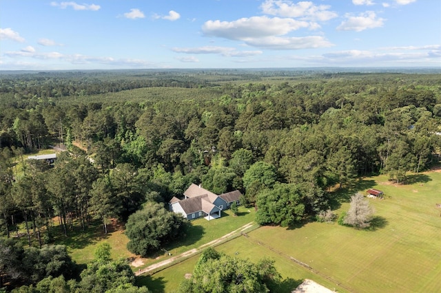 207 W Neyland St, Colmesneil, TX 75938 - bird's eye view featuring a wooded view