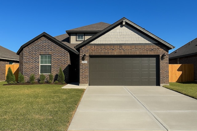 15695 Honey Cove Dr, Conroe, TX 77303 - view of front of house featuring brick siding, a garage, driveway, and a shingled roof
