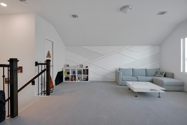 living area featuring lofted ceiling, carpet, baseboards, and recessed lighting