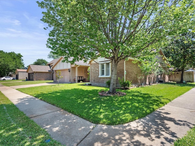 11602 Stone Bridge Dr, Houston, TX 77064 - obstructed view of property featuring brick siding, an attached garage, concrete driveway, and board and batten siding