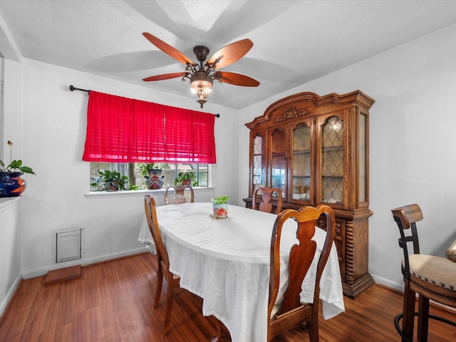 11602 Stone Bridge Dr, Houston, TX 77064 - dining area with ceiling fan, wood finished floors, and baseboards