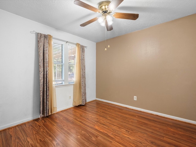 11602 Stone Bridge Dr, Houston, TX 77064 - unfurnished room with wood finished floors, baseboards, and ceiling fan