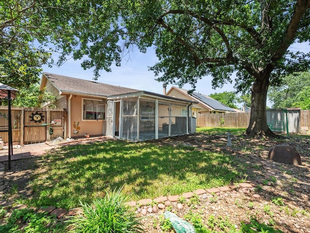 11602 Stone Bridge Dr, Houston, TX 77064 - rear view of house featuring a sunroom